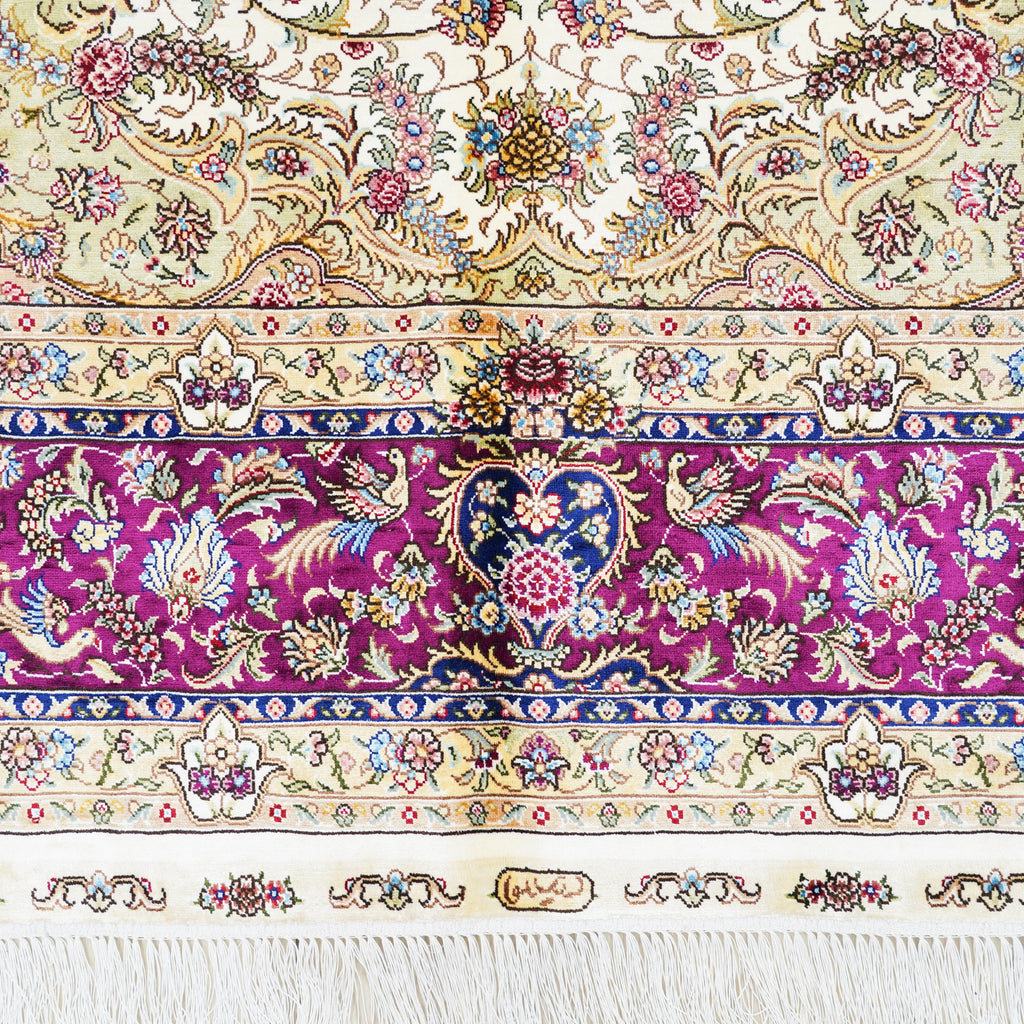 Close-up of ivory Persian rug medallion pattern