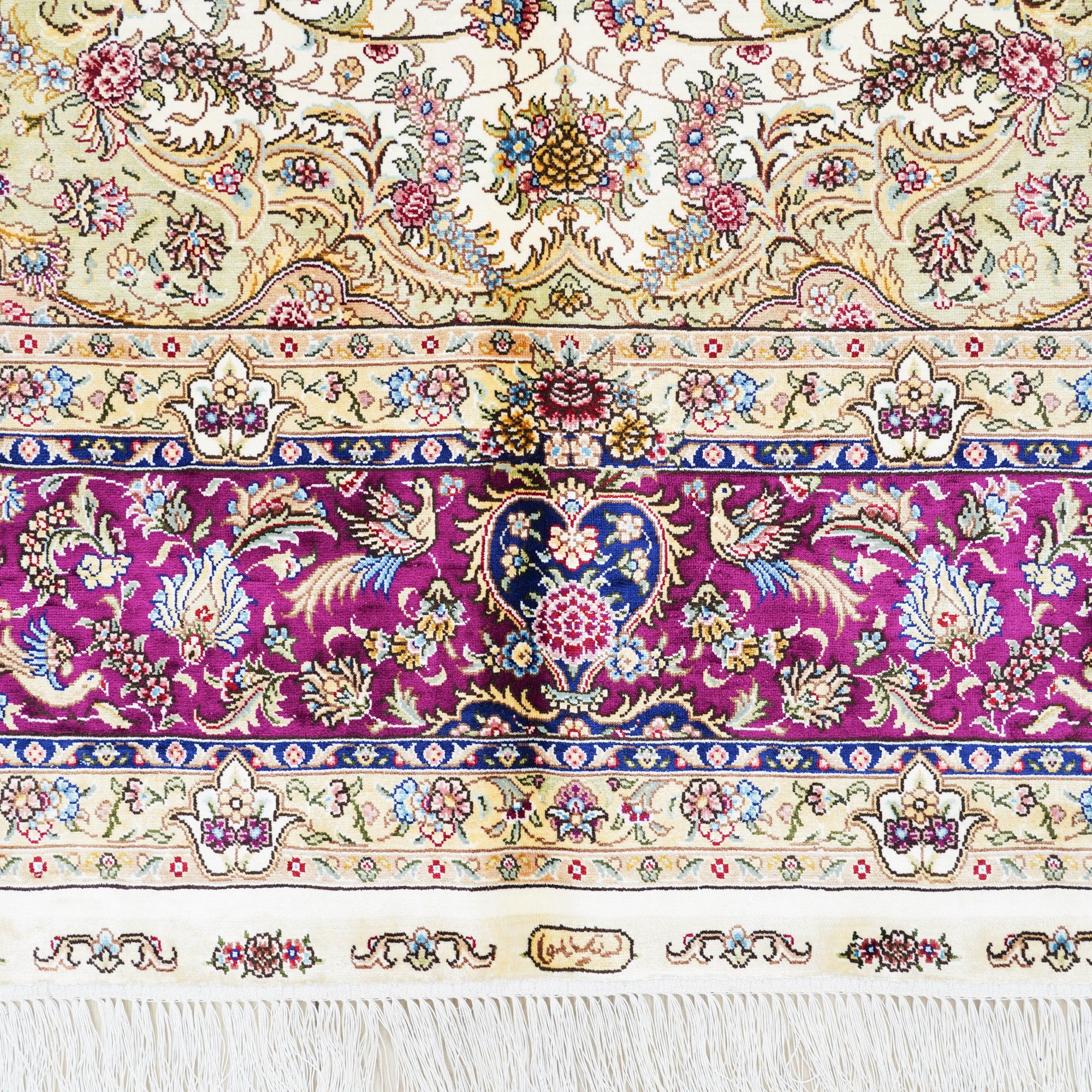 Close-up of ivory Persian rug medallion pattern