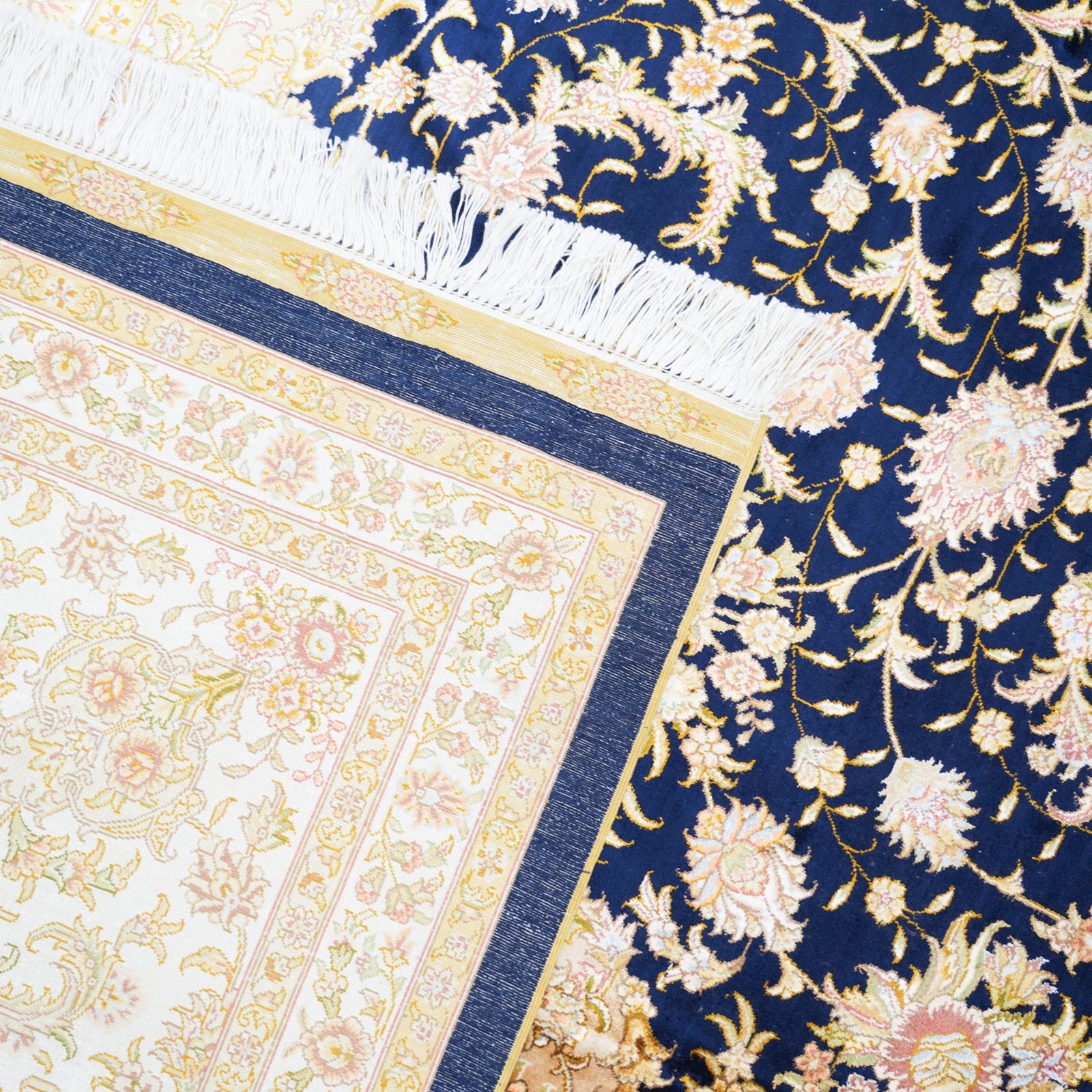 End fold of the Tabriz Imperial Medallion Rug